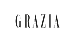 Black background with the Greca logo and the word 'GRAZIA' in stylized black letters.